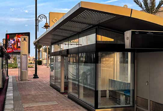 Abribus ARCHITECTURAL sur-mesure — double vitrage, climat extrême jusqu'à 40°C — MOQ 1